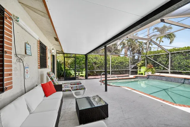 a view of swimming pool with a patio