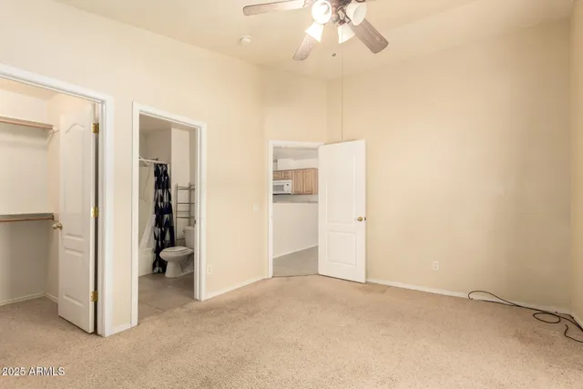 an empty room with a bathroom