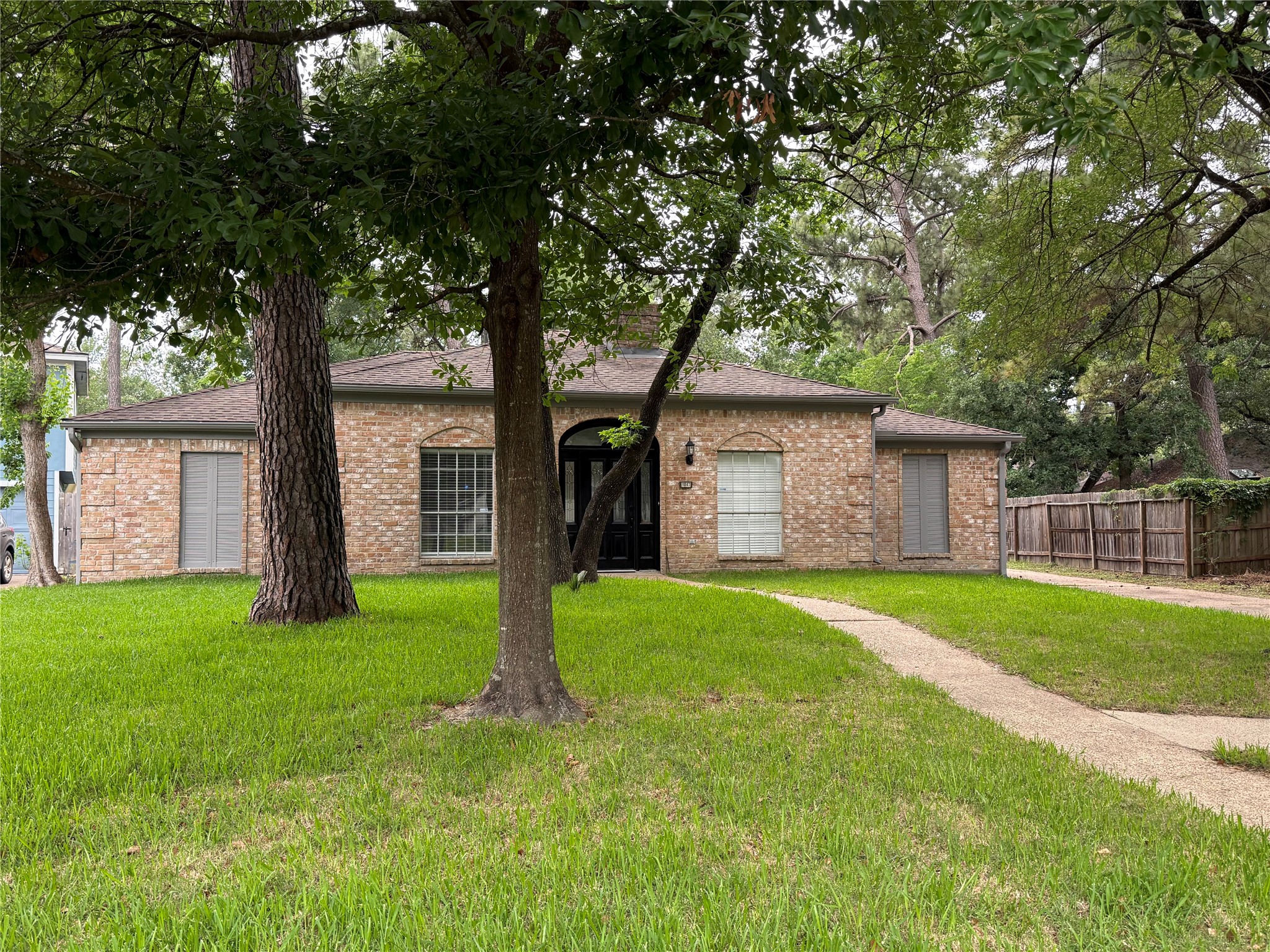 1847 Spruce Knob Drive Houston, TX 77339 - Photo 1 of 26 a front view of house with yard and green space