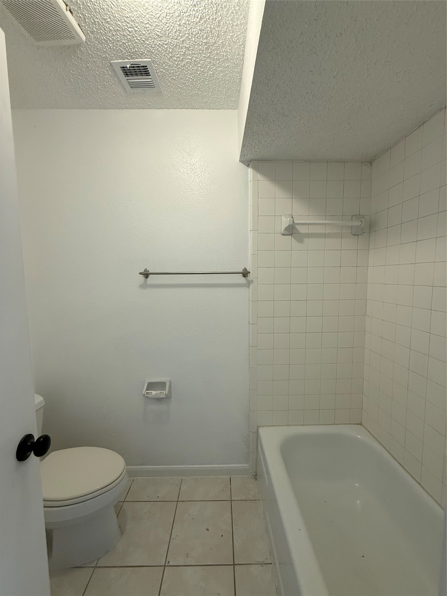 1847 Spruce Knob Drive Houston, TX 77339 - Photo 13 of 26 a bathroom with a granite countertop toilet and bathtub
