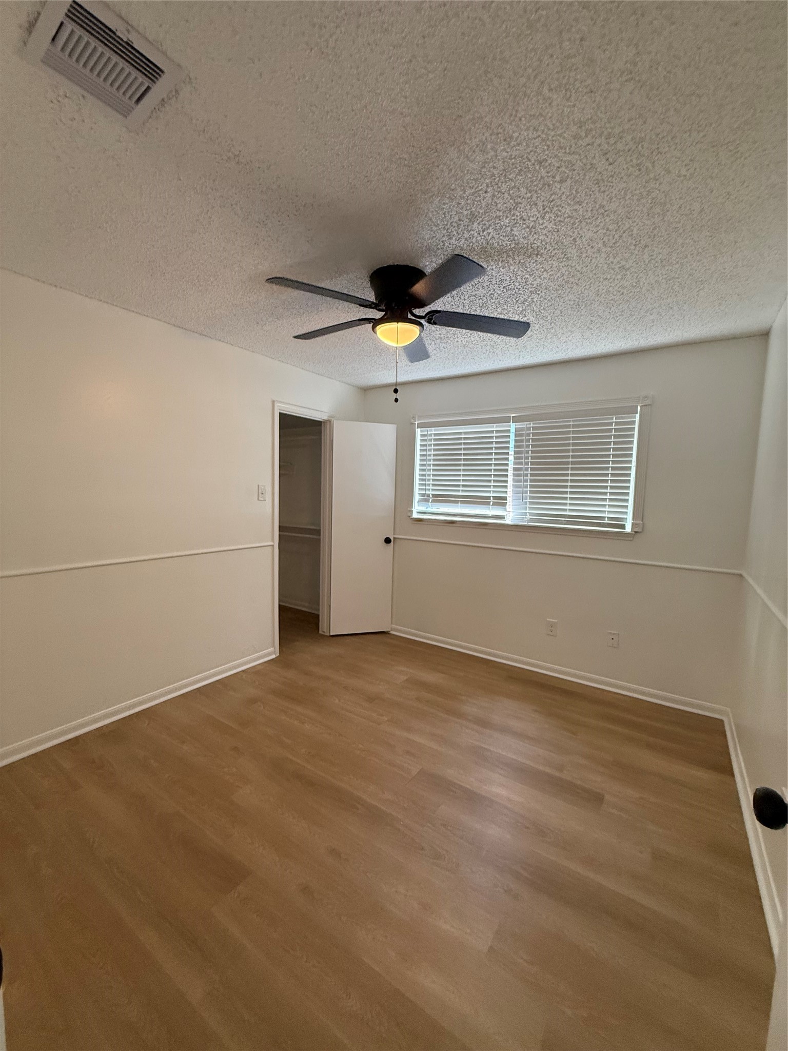 1847 Spruce Knob Drive Houston, TX 77339 - Photo 14 of 26 a view of an empty room with a window