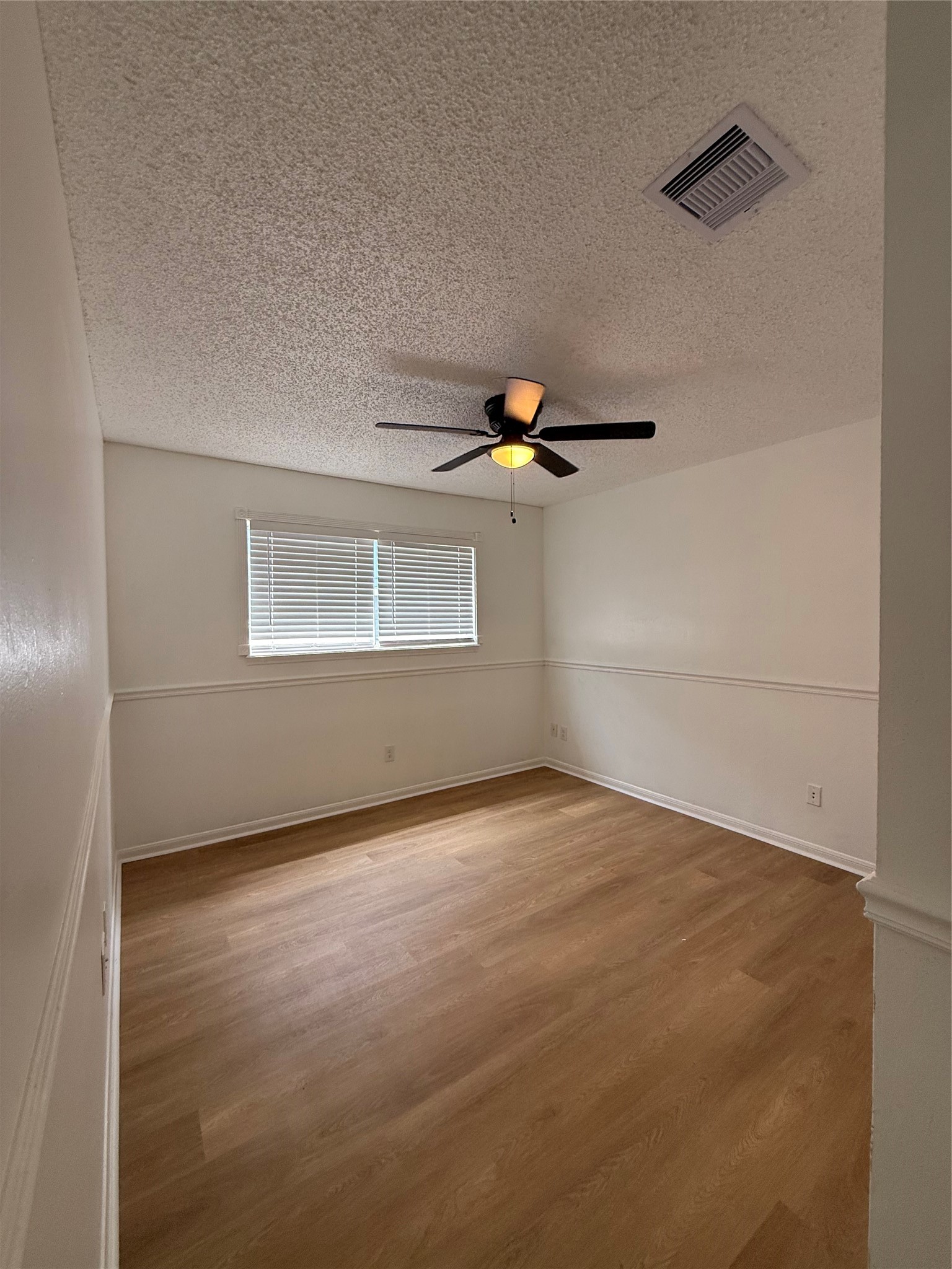 1847 Spruce Knob Drive Houston, TX 77339 - Photo 16 of 26 a view of an empty room with a window