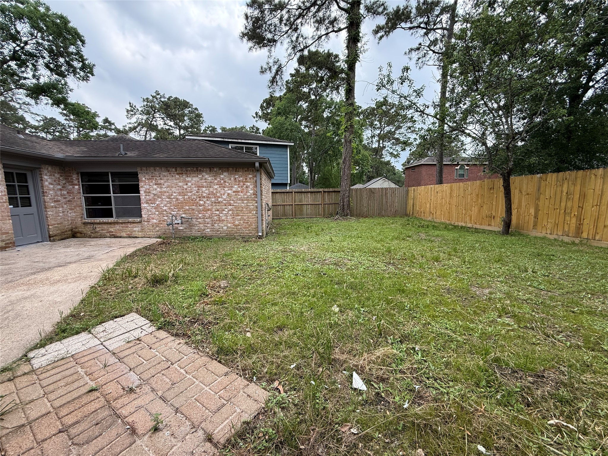1847 Spruce Knob Drive Houston, TX 77339 - Photo 21 of 26 a backyard of a house with lots of green space