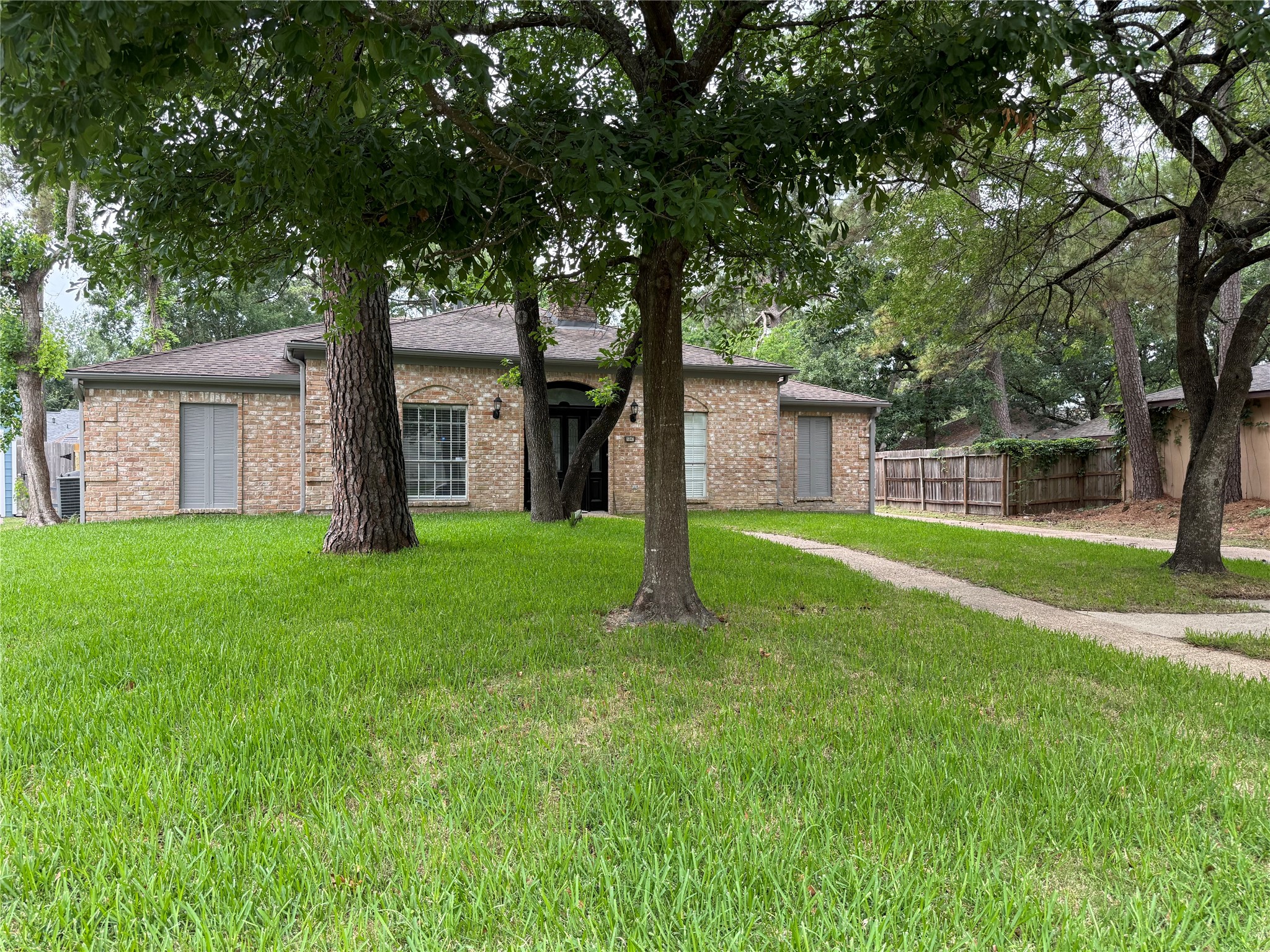 1847 Spruce Knob Drive Houston, TX 77339 - Photo 26 of 26 a house view with a garden space