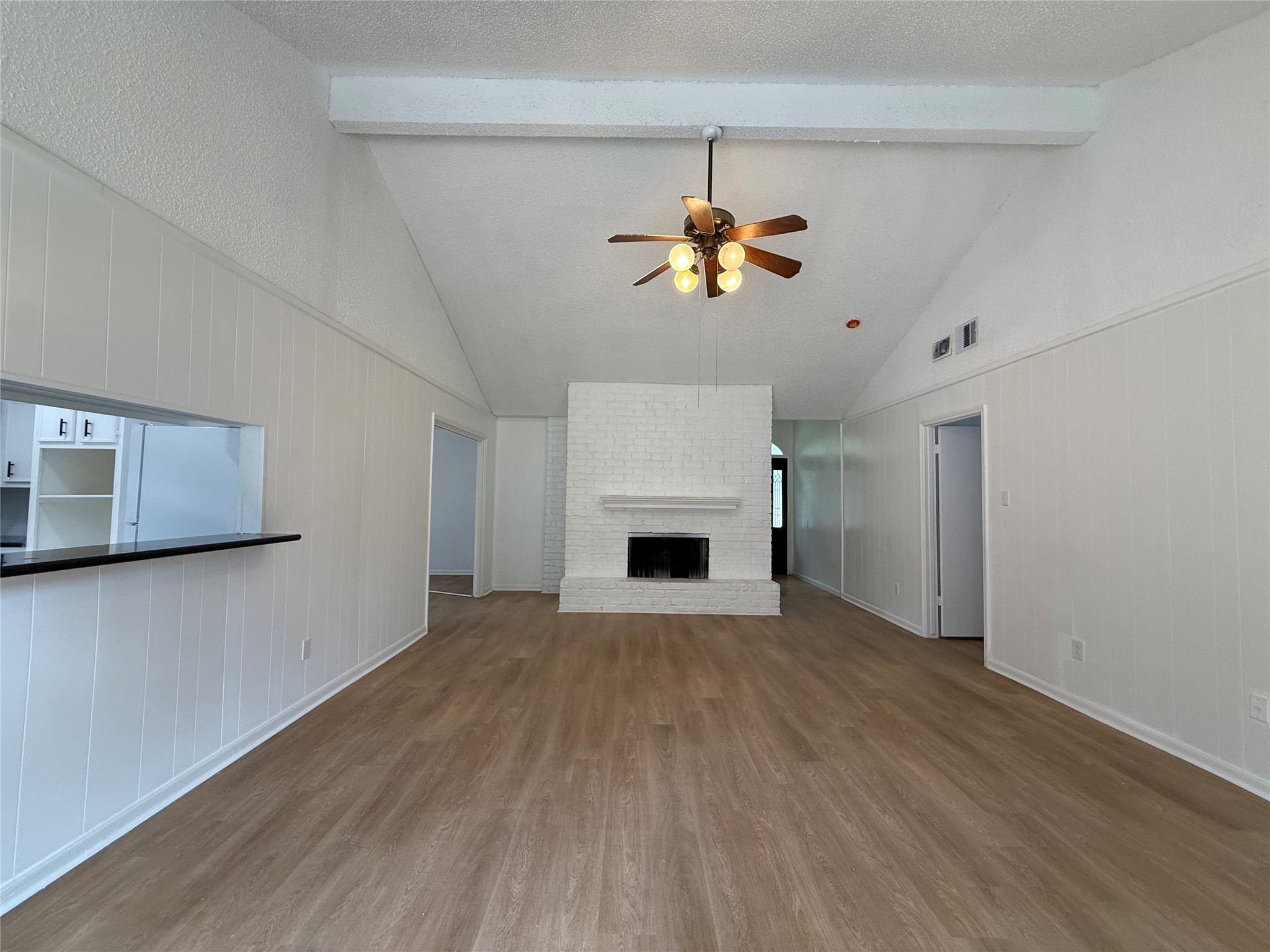 1847 Spruce Knob Drive Houston, TX 77339 - Photo 4 of 26 a view of an empty room with a window and fireplace