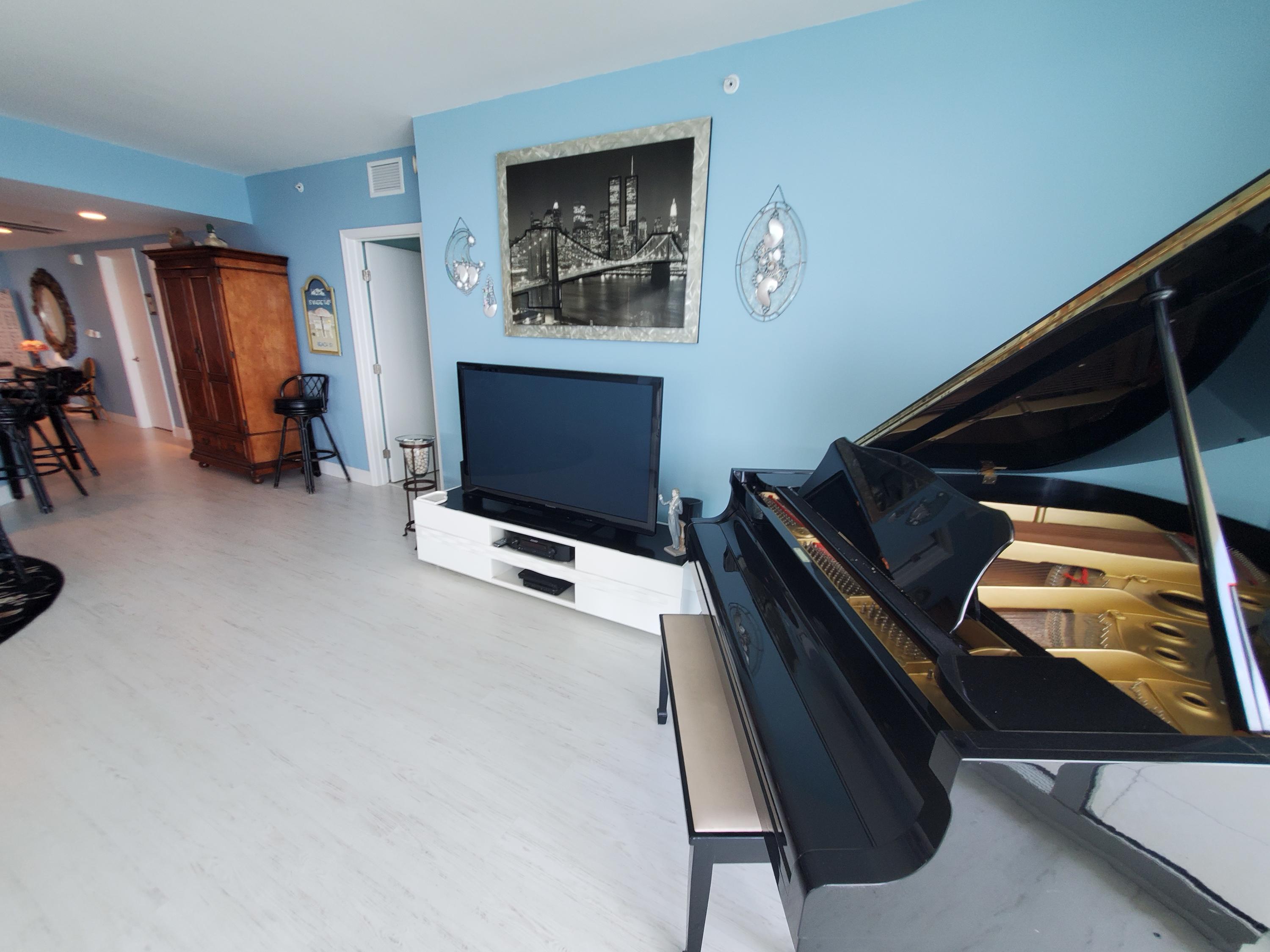 2640 Lake Shore Drive, Unit 2016 Riviera Beach, FL 33404 - Photo 12 of 50 LIVING ROOM MEDIA -ENTERTAINMENT
