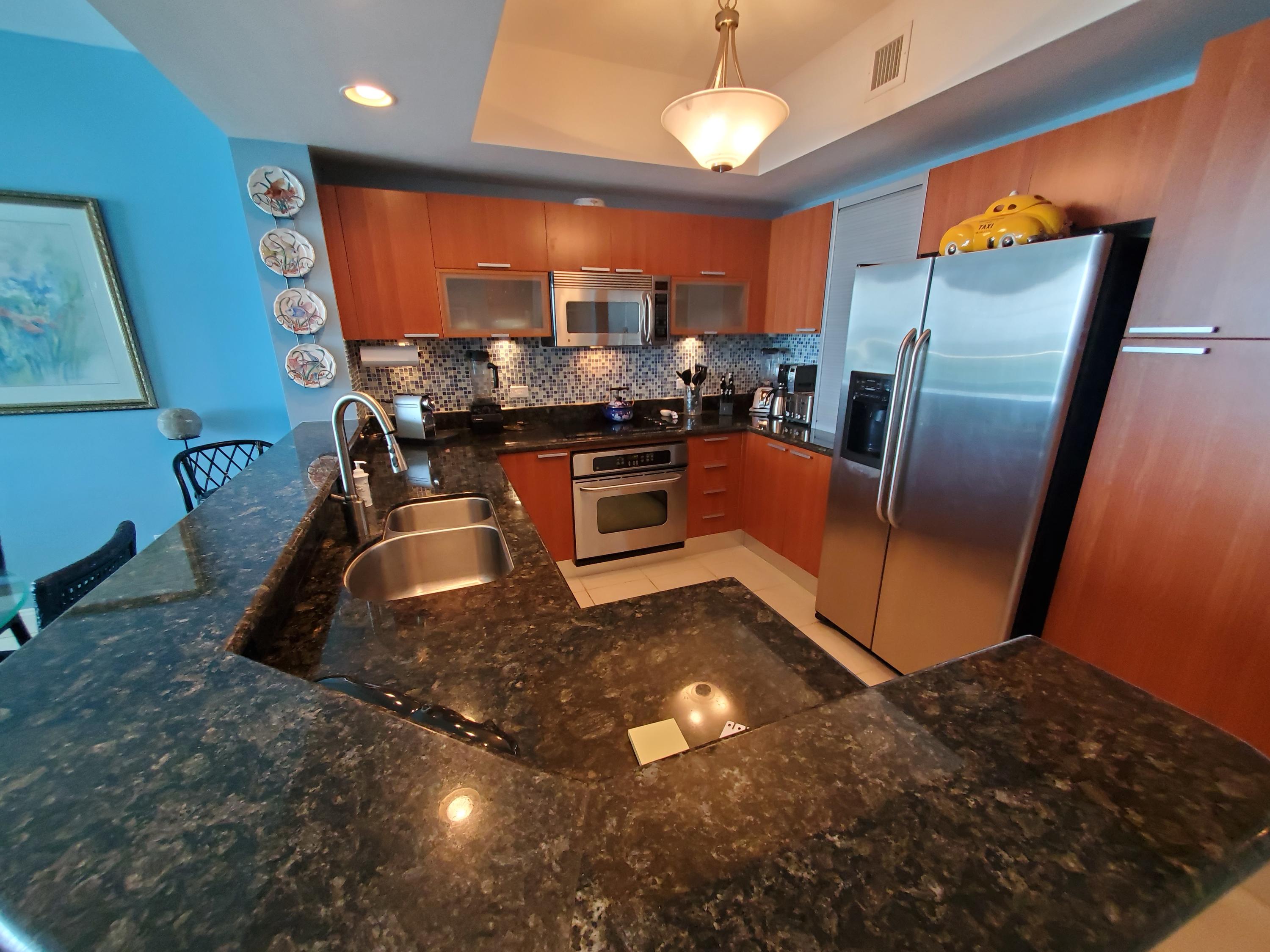 2640 Lake Shore Drive, Unit 2016 Riviera Beach, FL 33404 - Photo 15 of 50 GRANITE COUNTERTOPS
