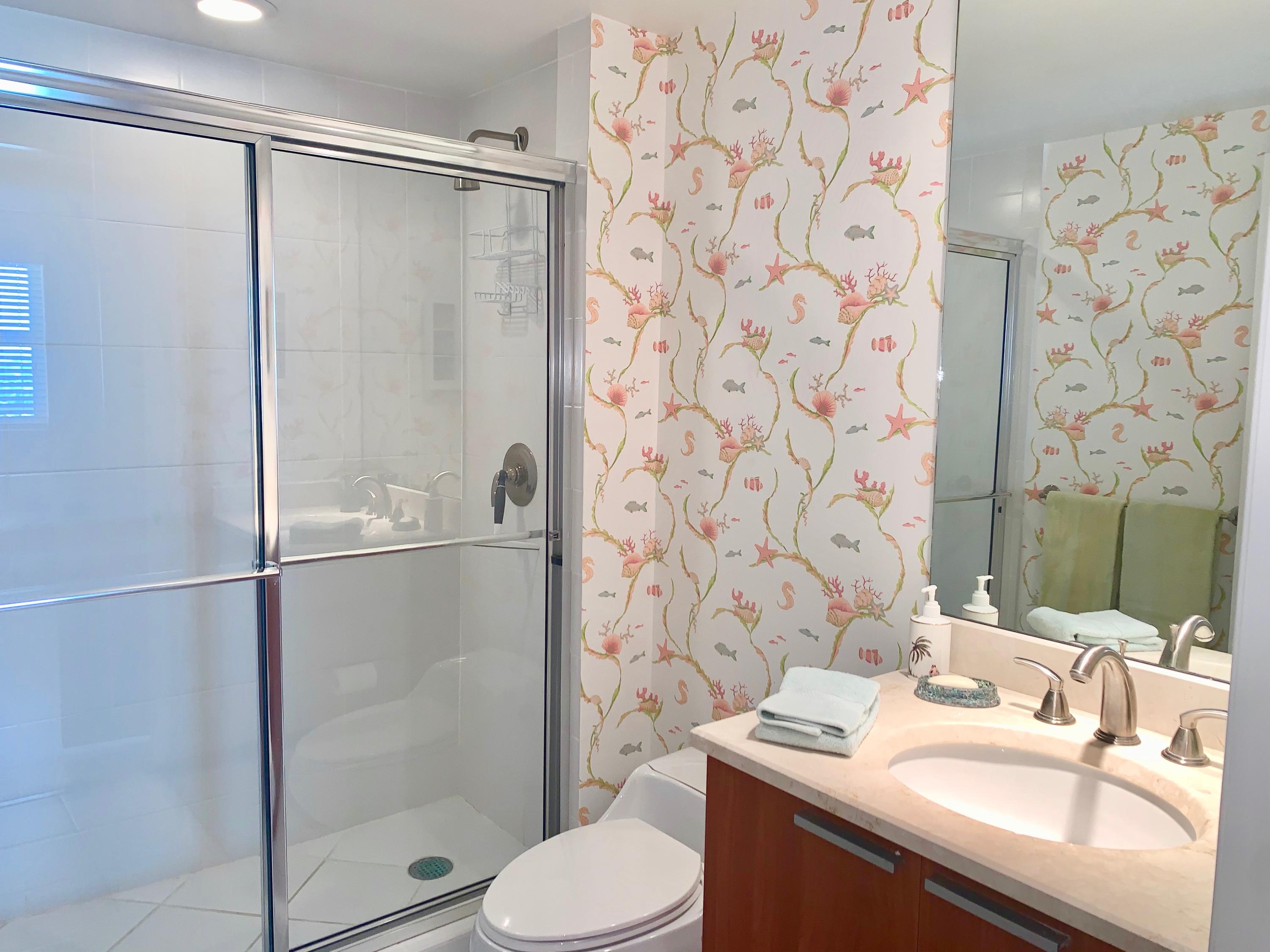 2640 Lake Shore Drive, Unit 2016 Riviera Beach, FL 33404 - Photo 26 of 50 BATHROOM 2 - WALK IN SHOWER