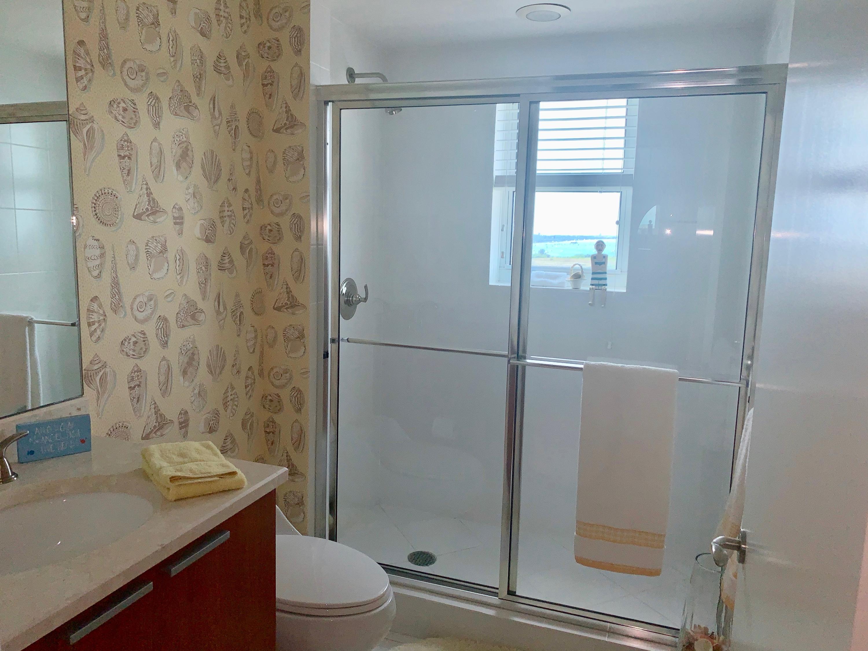 2640 Lake Shore Drive, Unit 2016 Riviera Beach, FL 33404 - Photo 32 of 50 3RD BATHROOM = WALK IN SHOWER