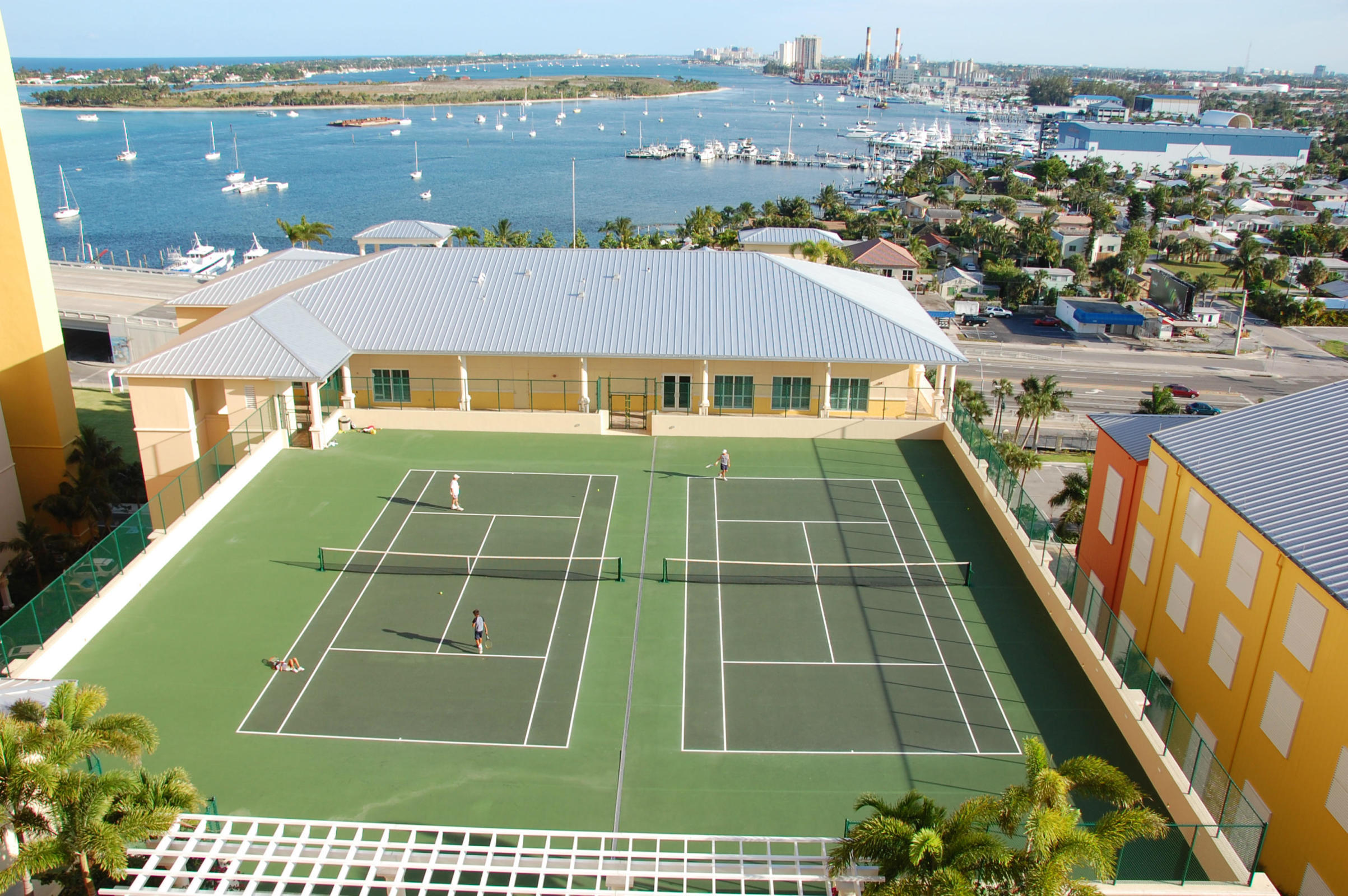 2640 Lake Shore Drive, Unit 2016 Riviera Beach, FL 33404 - Photo 41 of 50 TENNIS COURTS WITH VIEWS!