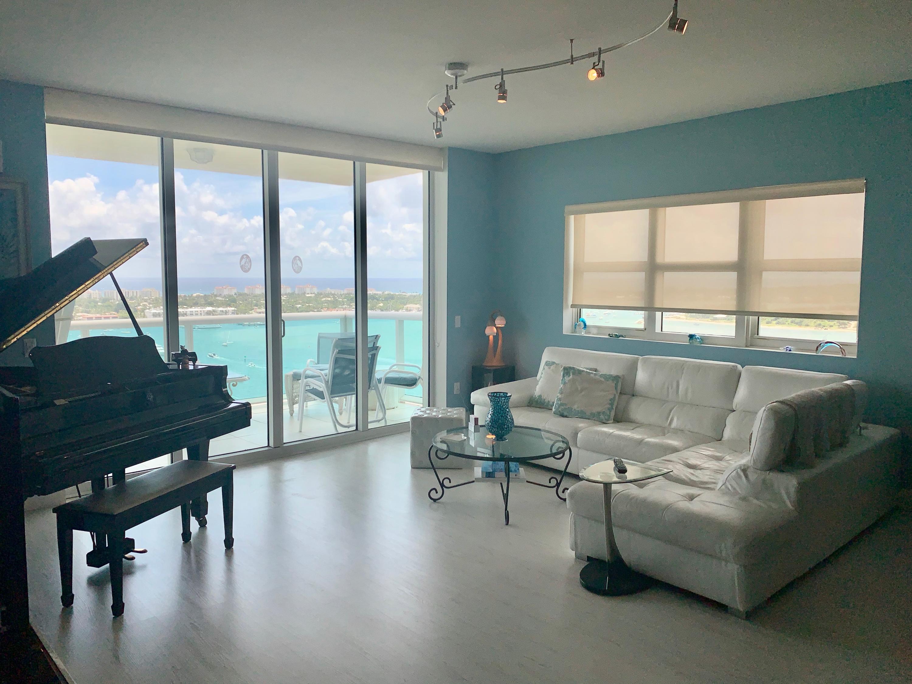 2640 Lake Shore Drive, Unit 2016 Riviera Beach, FL 33404 - Photo 9 of 50 GREAT ROOM - ALL IMPACT GLASS