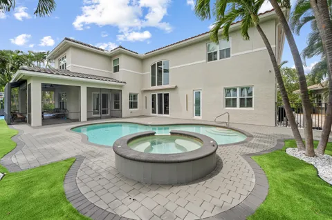a view of a house with a swimming pool