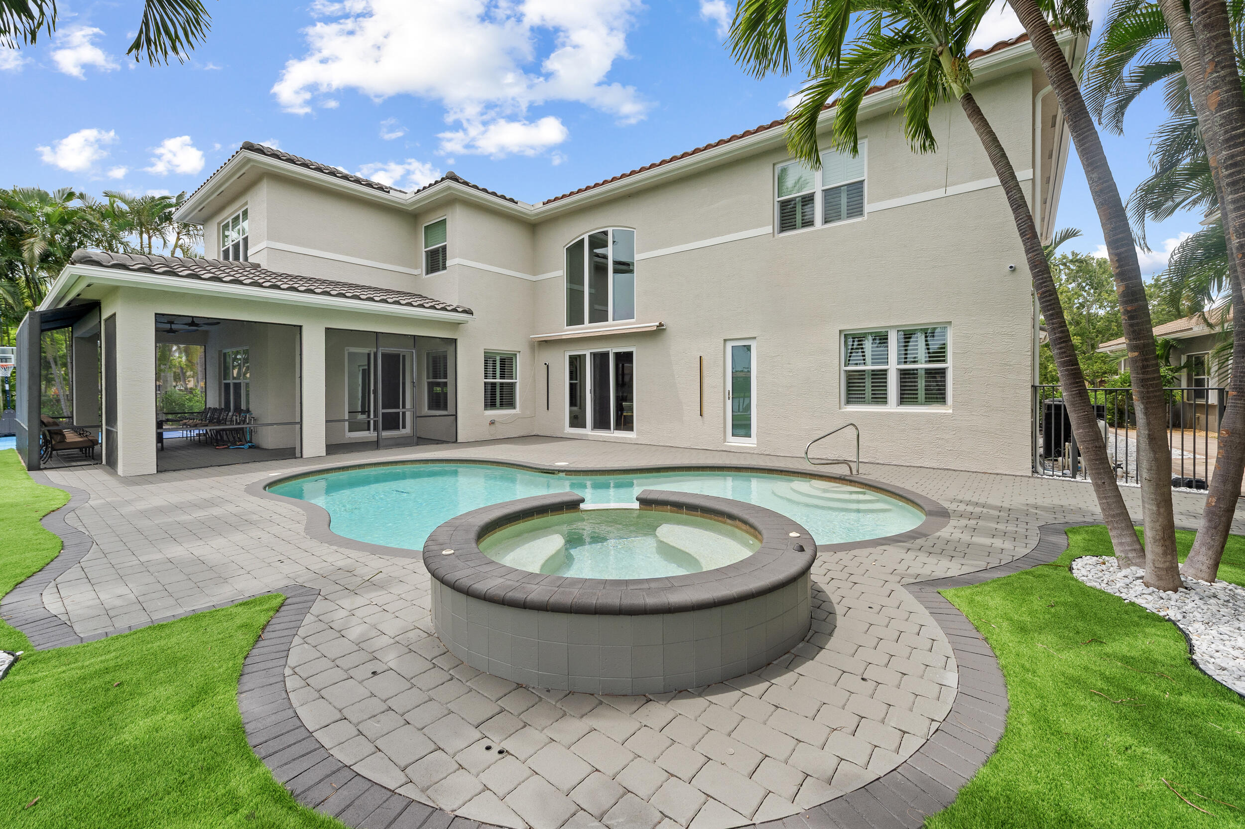 8680 Daystar Ridge Point Boynton Beach, FL 33473 - Photo 15 of 25 a view of a house with a swimming pool