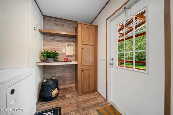 a spacious bedroom with a large bed and a window