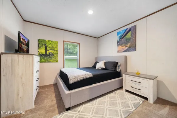 a view of a patio with a small yard