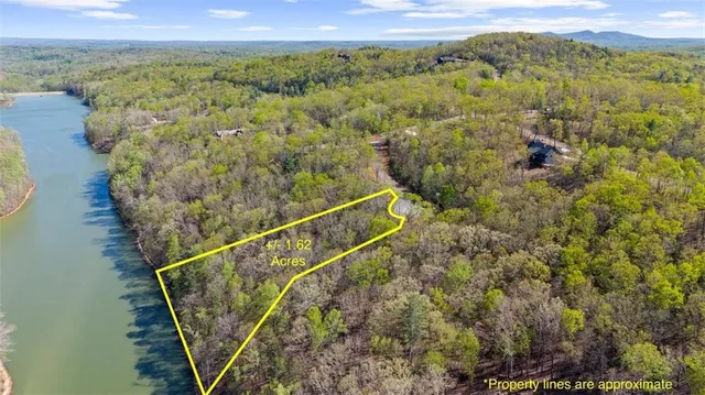 a view of a balcony with a forest