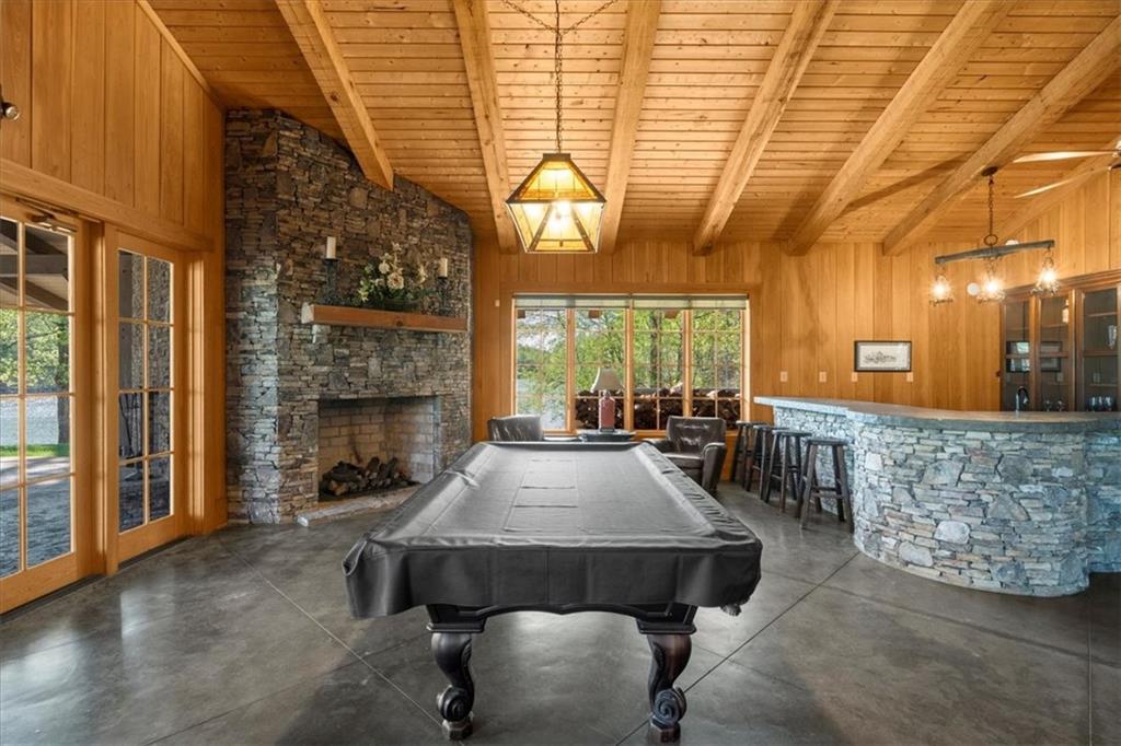 0 Waterside Trail Cleveland, GA 30528 - Photo 21 of 32 a living room with furniture a fireplace and a table