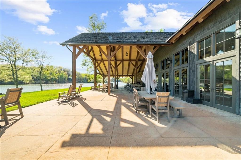 0 Waterside Trail Cleveland, GA 30528 - Photo 28 of 32 a building outdoor space with patio furniture and swimming pool