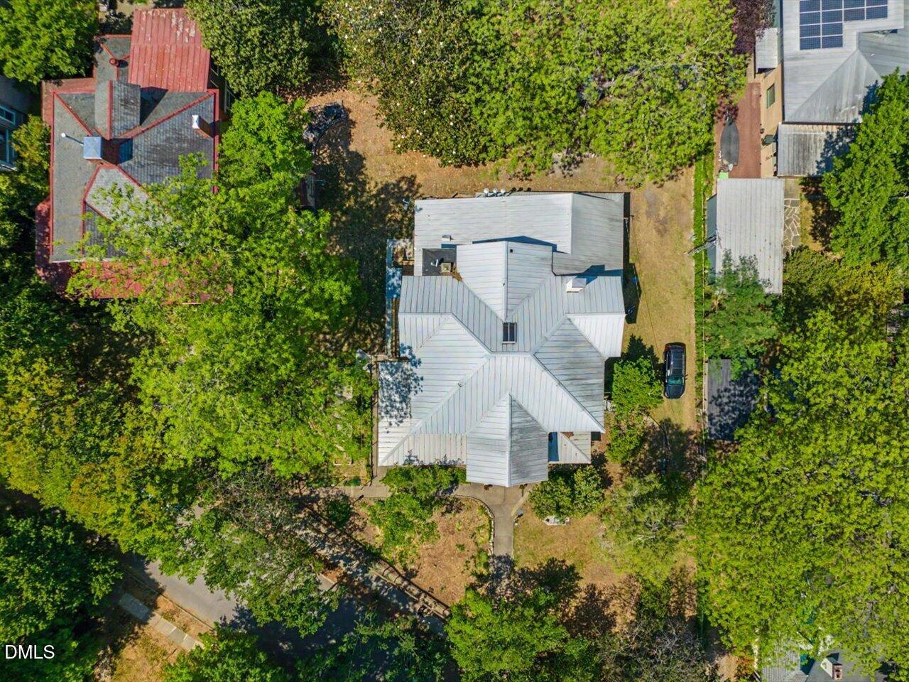 215 Hillcrest Road Raleigh, NC 27605 - Photo 92 of 97 an aerial view of a house with a garden