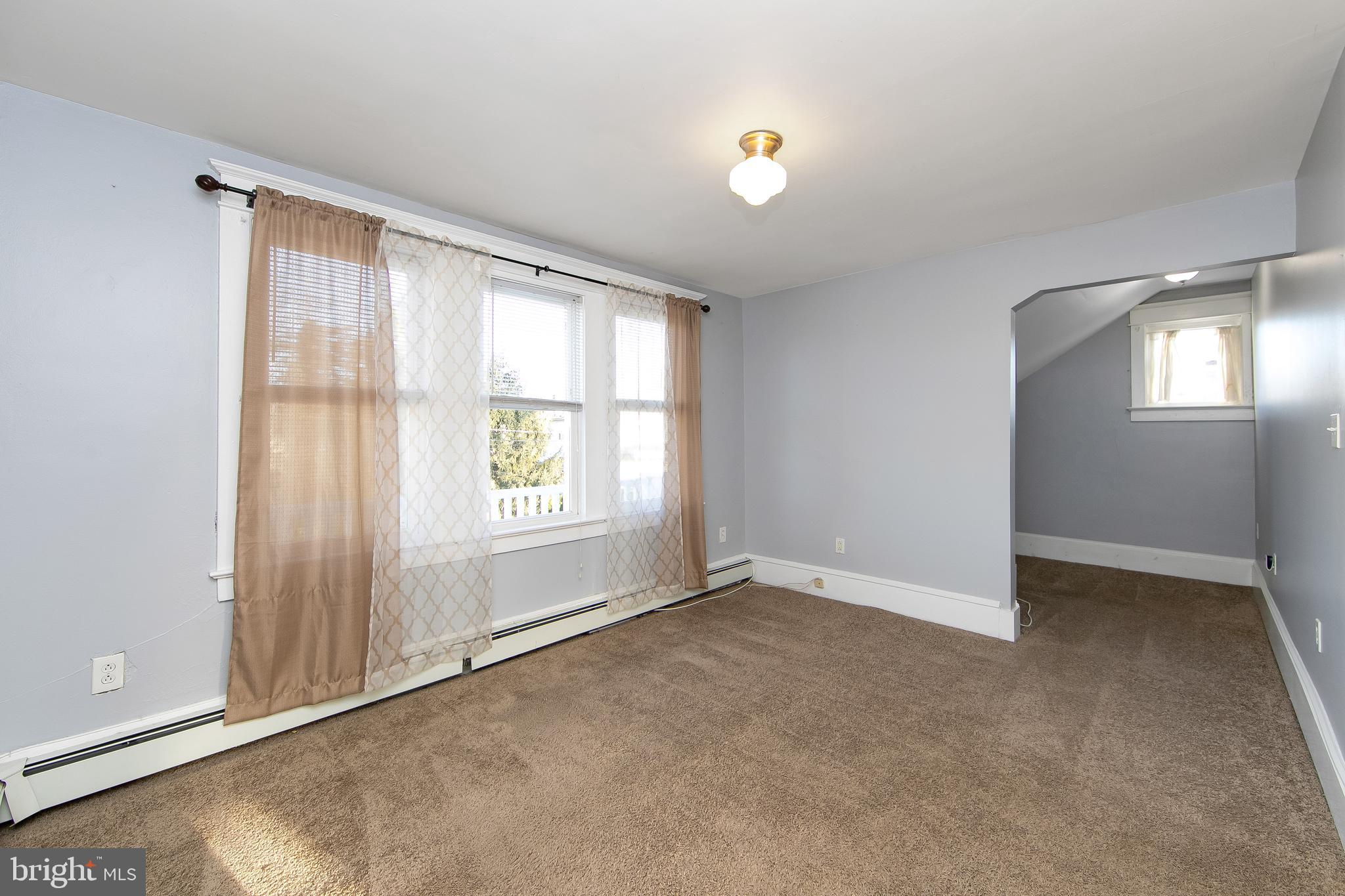 11-13 Church Street, Unit B Glassboro, NJ 08028 - Photo 13 of 33 an empty room with windows