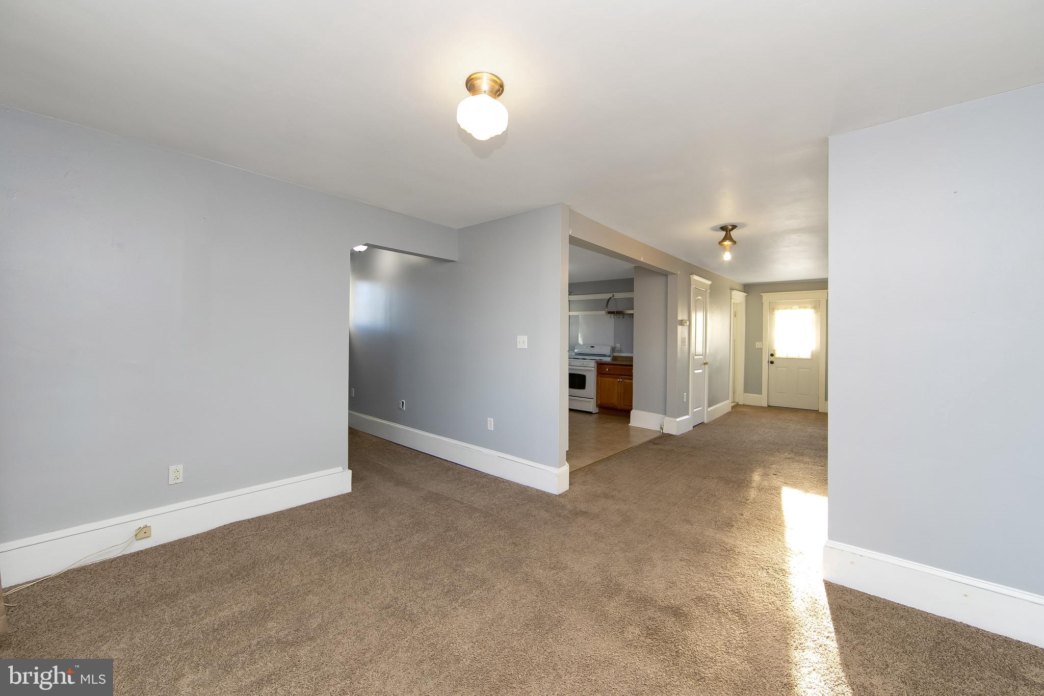 11-13 Church Street, Unit B Glassboro, NJ 08028 - Photo 14 of 33 a view of an empty room with a window