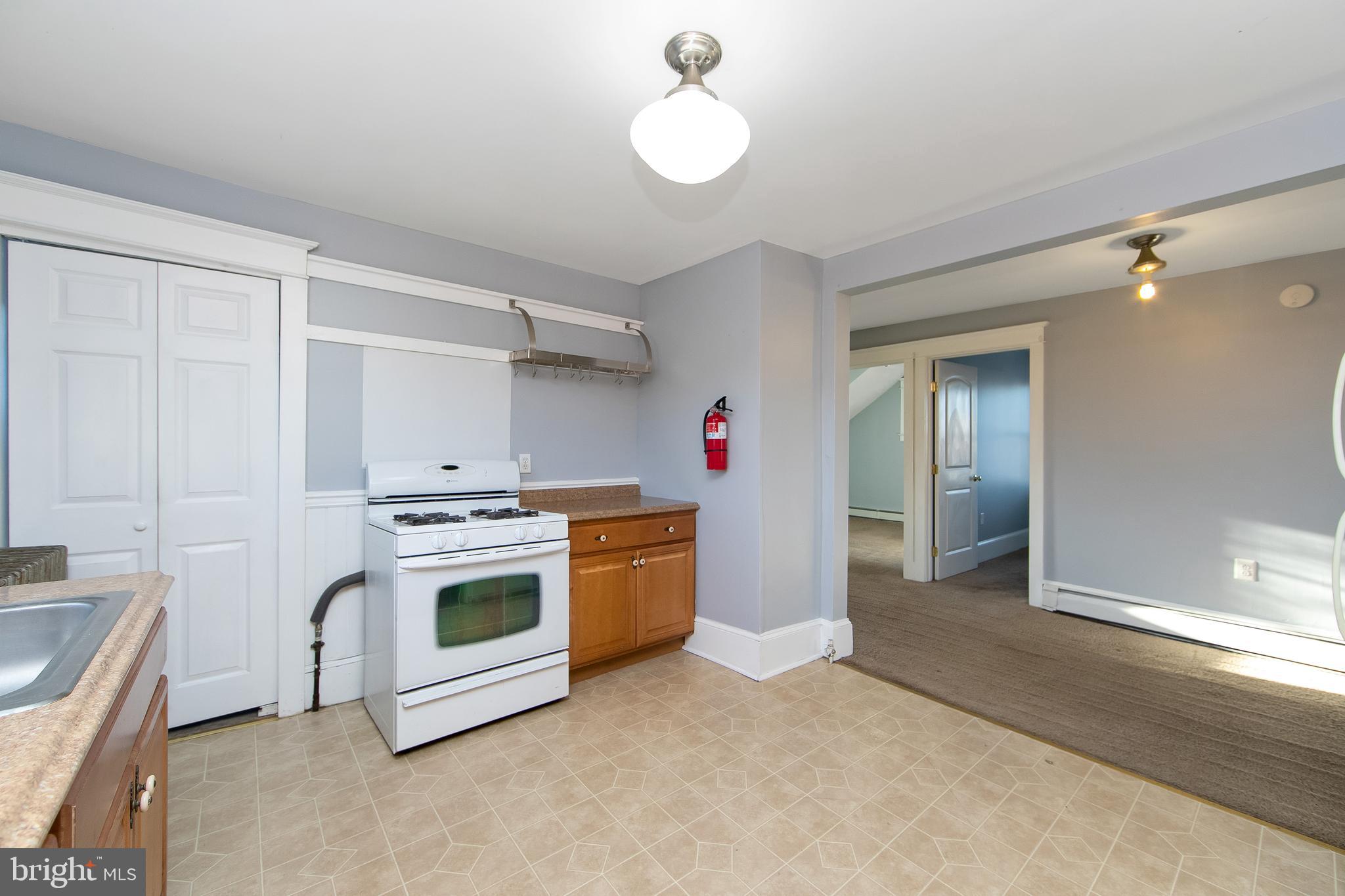 11-13 Church Street, Unit B Glassboro, NJ 08028 - Photo 22 of 33 a kitchen with a stove and a sink