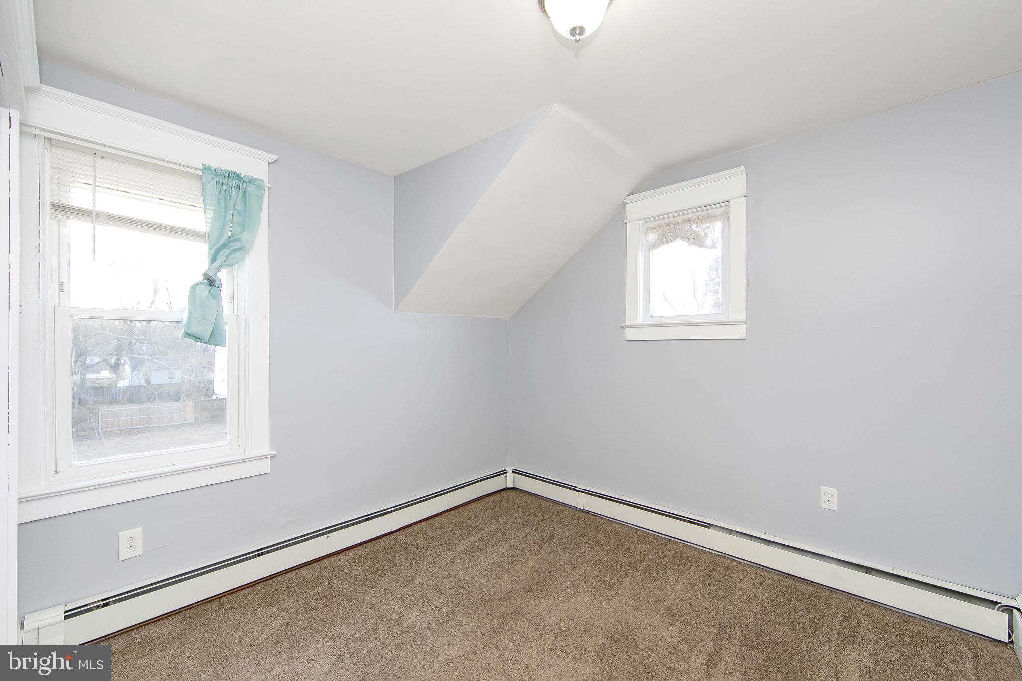 11-13 Church Street, Unit B Glassboro, NJ 08028 - Photo 27 of 33 an empty room with a window