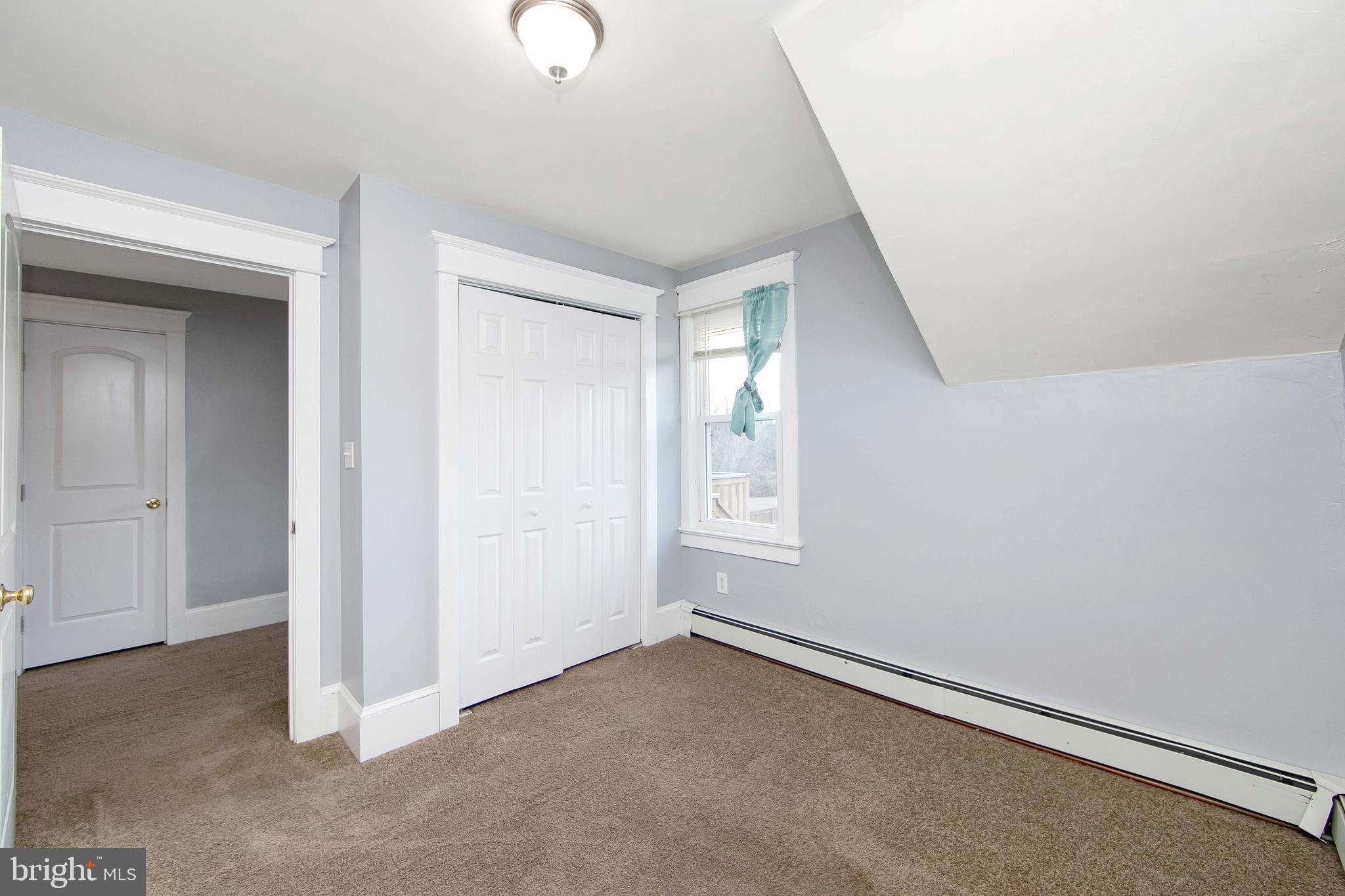 11-13 Church Street, Unit B Glassboro, NJ 08028 - Photo 28 of 33 an empty room with windows