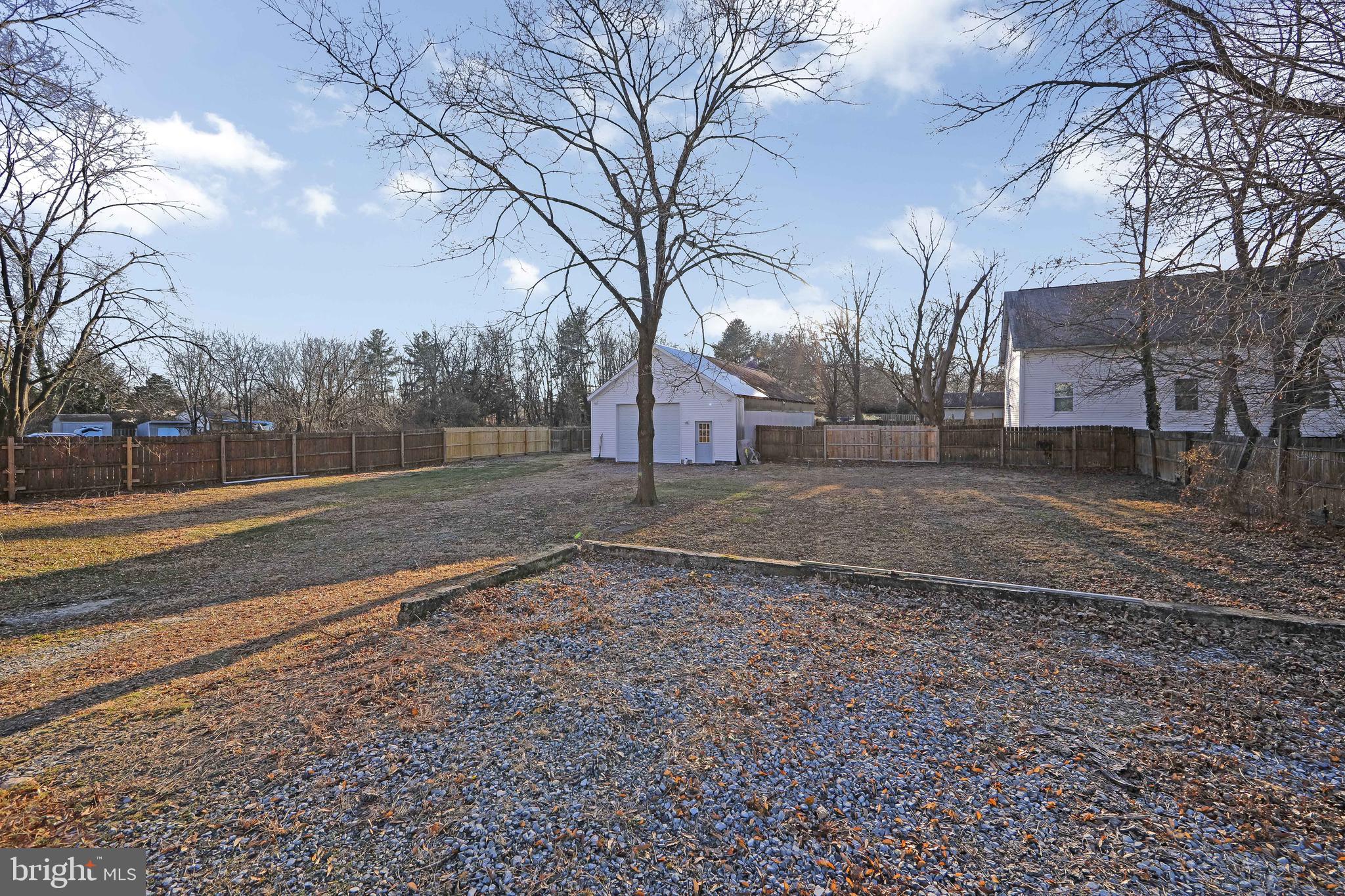 11-13 Church Street, Unit B Glassboro, NJ 08028 - Photo 32 of 33 a view of a yard with a house