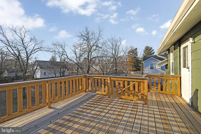 a view of a chairs on the roof deck