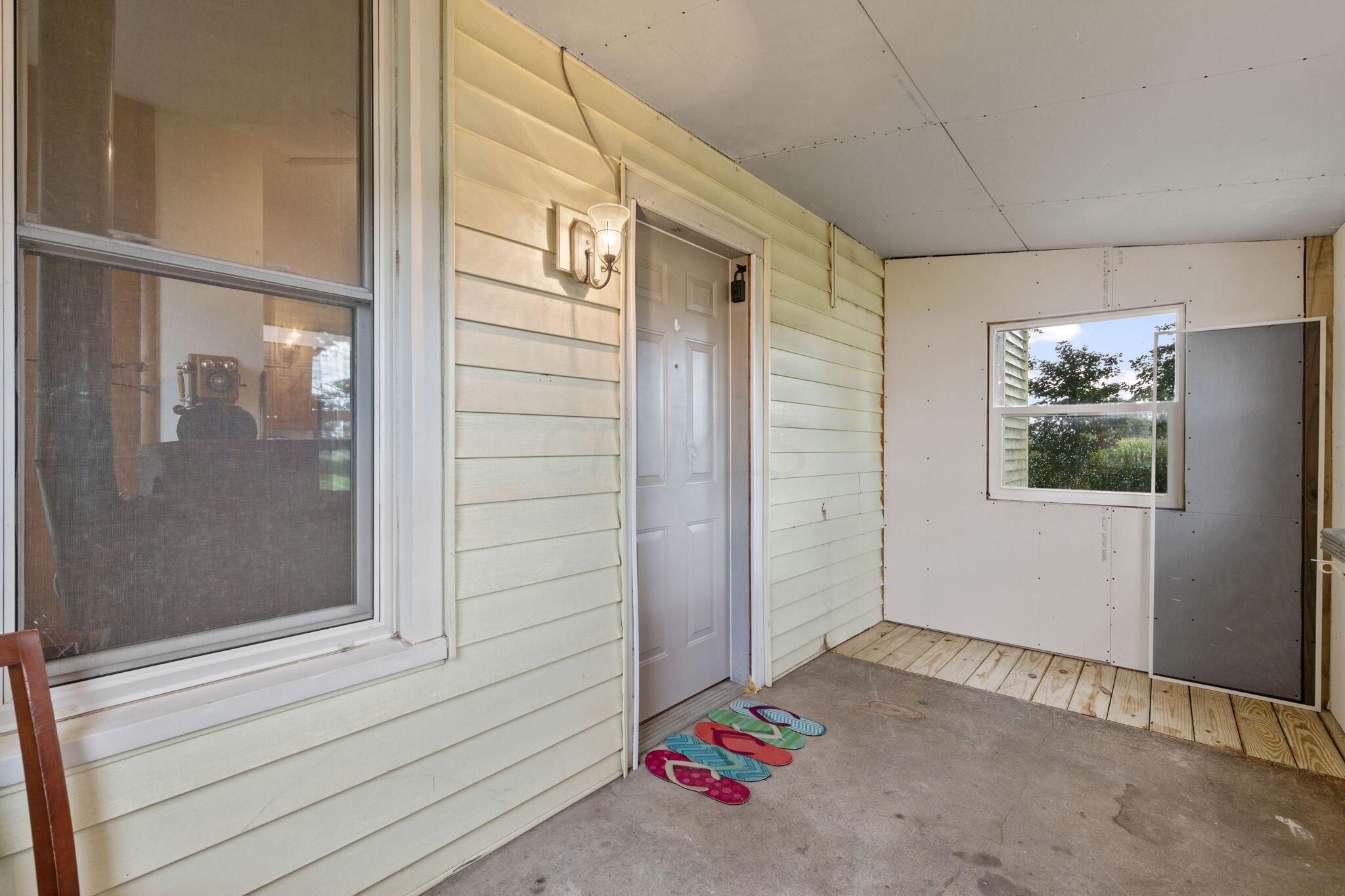 9501 Lancaster-Newark Road Northeast Baltimore, OH 43105 - Photo 32 of 46 Enclosed Back Porch - 9501 Lancaster-Newark Road, Baltimore, OH 43105