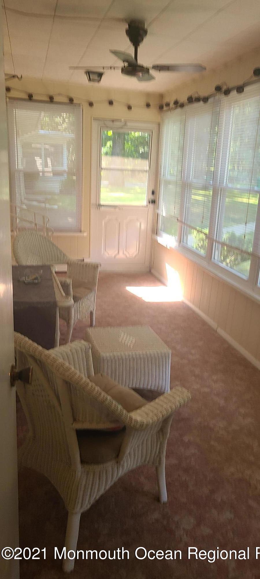 4 A West Road Jackson, NJ 08527 - Photo 22 of 23 a living room with furniture and a large window