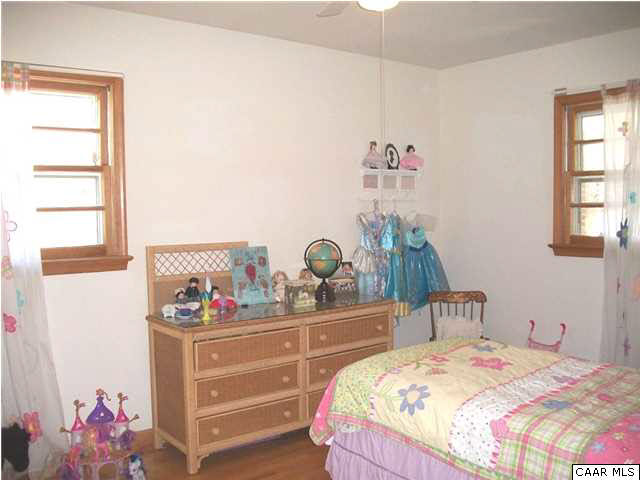 1816 Old Orchard Road Free Union, VA 22940 - Photo 11 of 16 a bedroom with a bed and a window