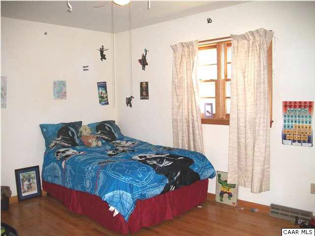 1816 Old Orchard Road Free Union, VA 22940 - Photo 12 of 16 a bedroom with bed and window