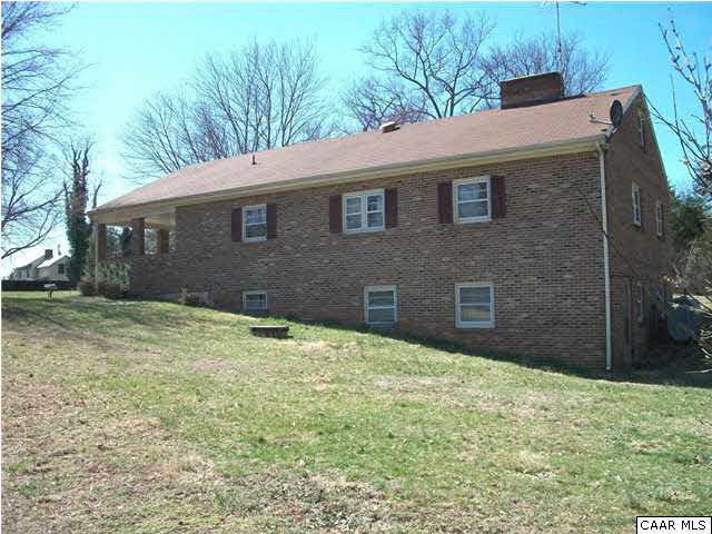 1816 Old Orchard Road Free Union, VA 22940 - Photo 6 of 16 a brick house with a yard