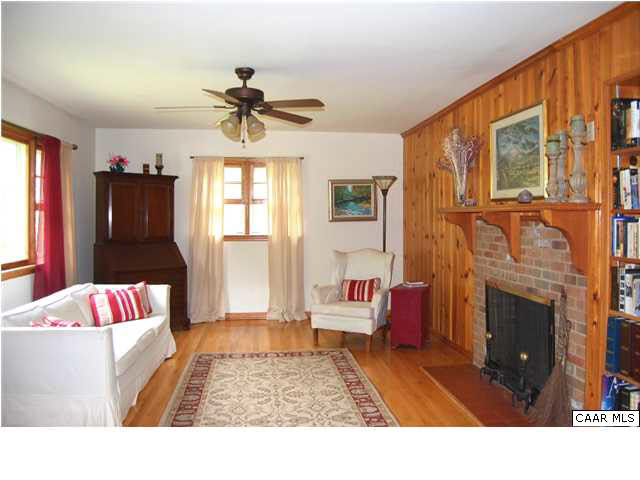 1816 Old Orchard Road Free Union, VA 22940 - Photo 7 of 16 a living room with furniture and a fireplace