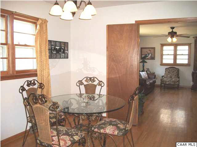 1816 Old Orchard Road Free Union, VA 22940 - Photo 9 of 16 a view of a dining room with furniture and wooden floor
