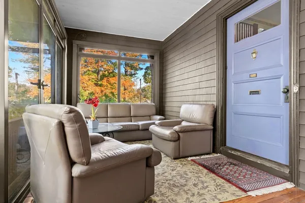 a view of a dining room with furniture window and outside view