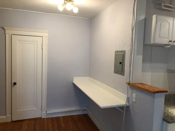 a bathroom with a sink and a window