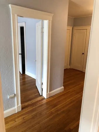 a view of a bathroom from a hallway