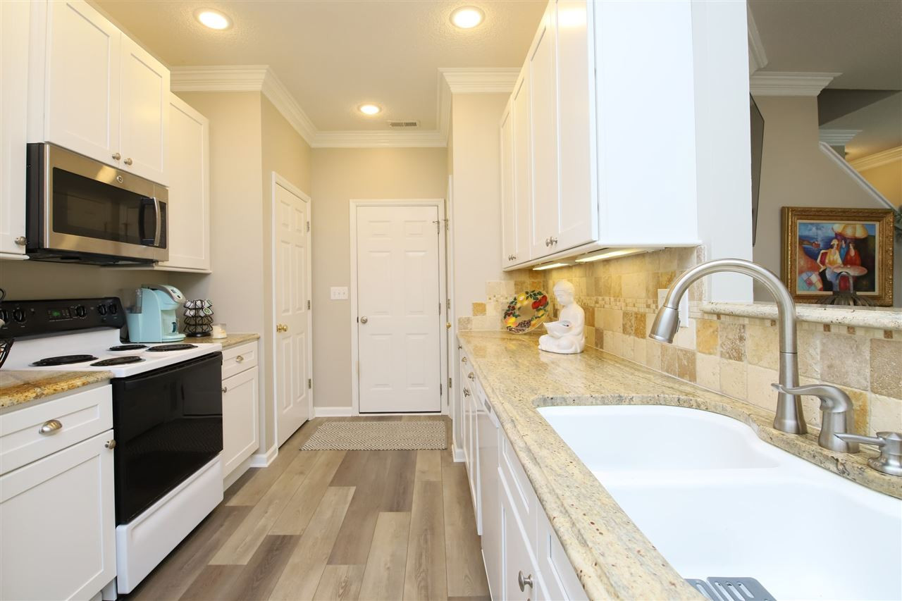 2412 Pumpkin Ridge Way Raleigh, NC 27604 - Photo 12 of 30 another angle of beautiful kitchen leading to amazing garage Kitchen