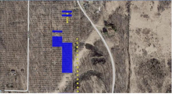 a bathroom with a shower and a white sink