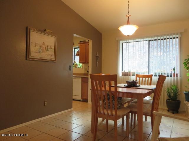 963 Calle Amarillo Rio Rico, AZ 85648 - Photo 5 of 31 a view of a dining room with furniture and window