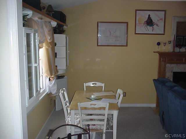 1424 Oldbury Road Midlothian, VA 23113 - Photo 6 of 6 a view of a dining room with furniture and wooden floor