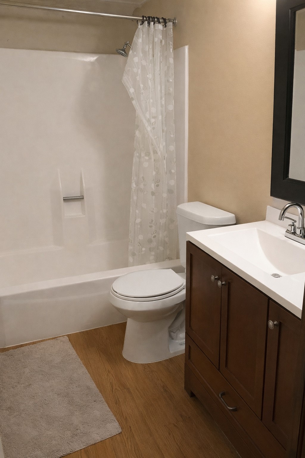 1000 West 26th Street, Unit 112 Austin, TX 78705 - Photo 2 of 14 a bathroom with a sink a toilet and shower