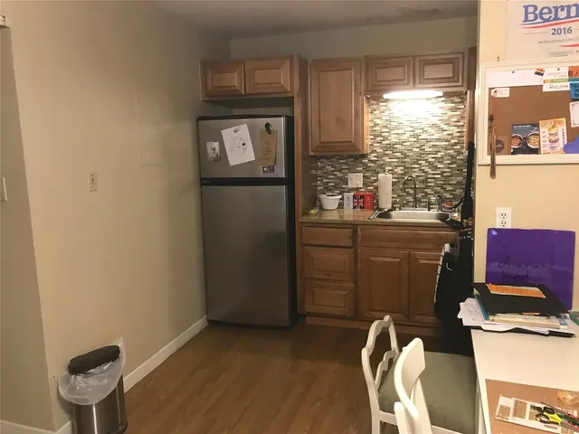 a room filled with furniture and a window