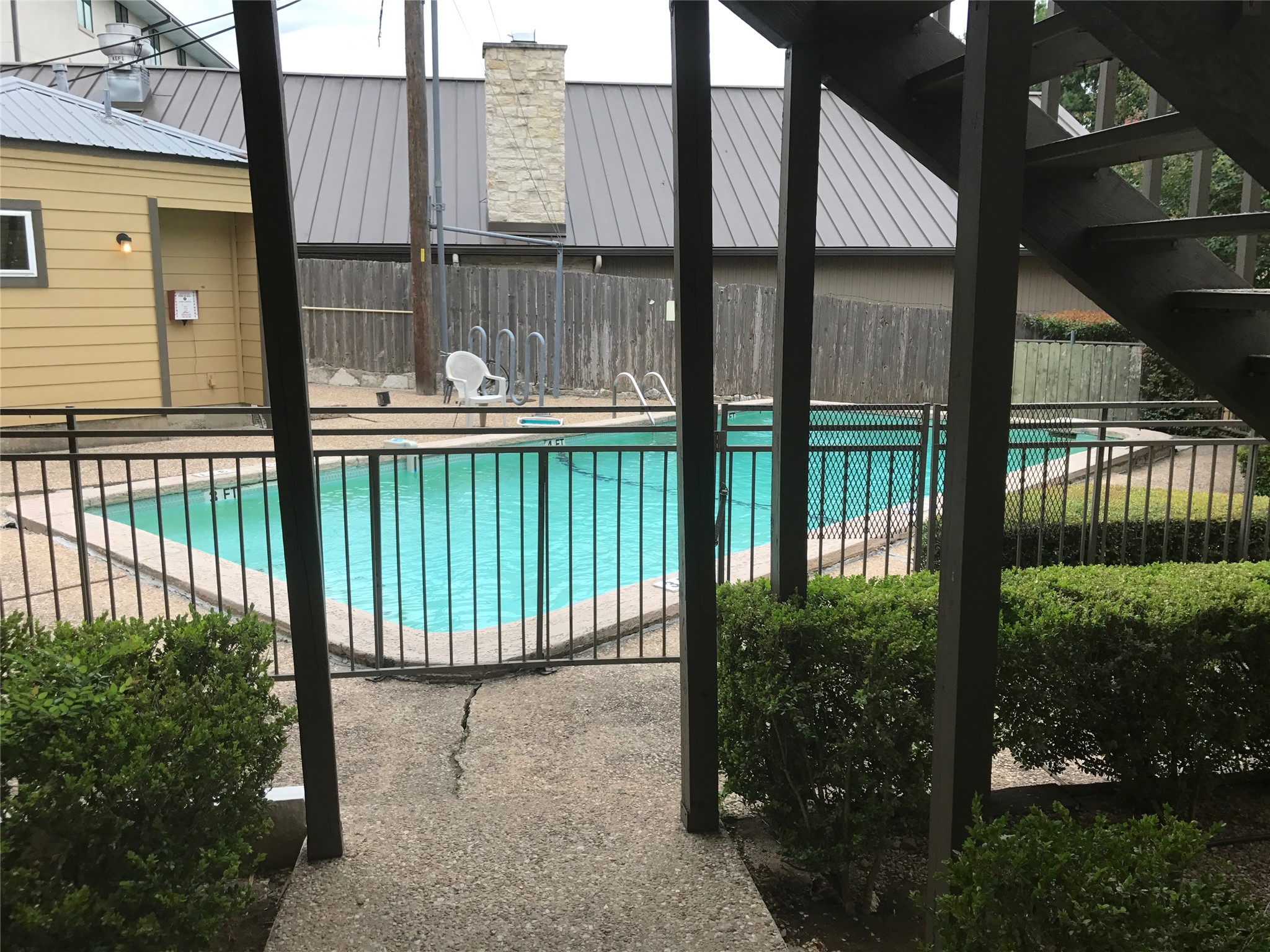 1000 West 26th Street, Unit 112 Austin, TX 78705 - Photo 8 of 14 a view of a balcony with a floor to ceiling window