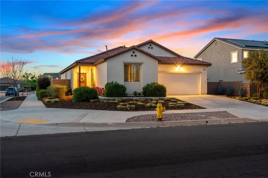 4415 Banana Grove Riverside, CA 92501 - Photo 1 of 1 a front view of a house with a yard