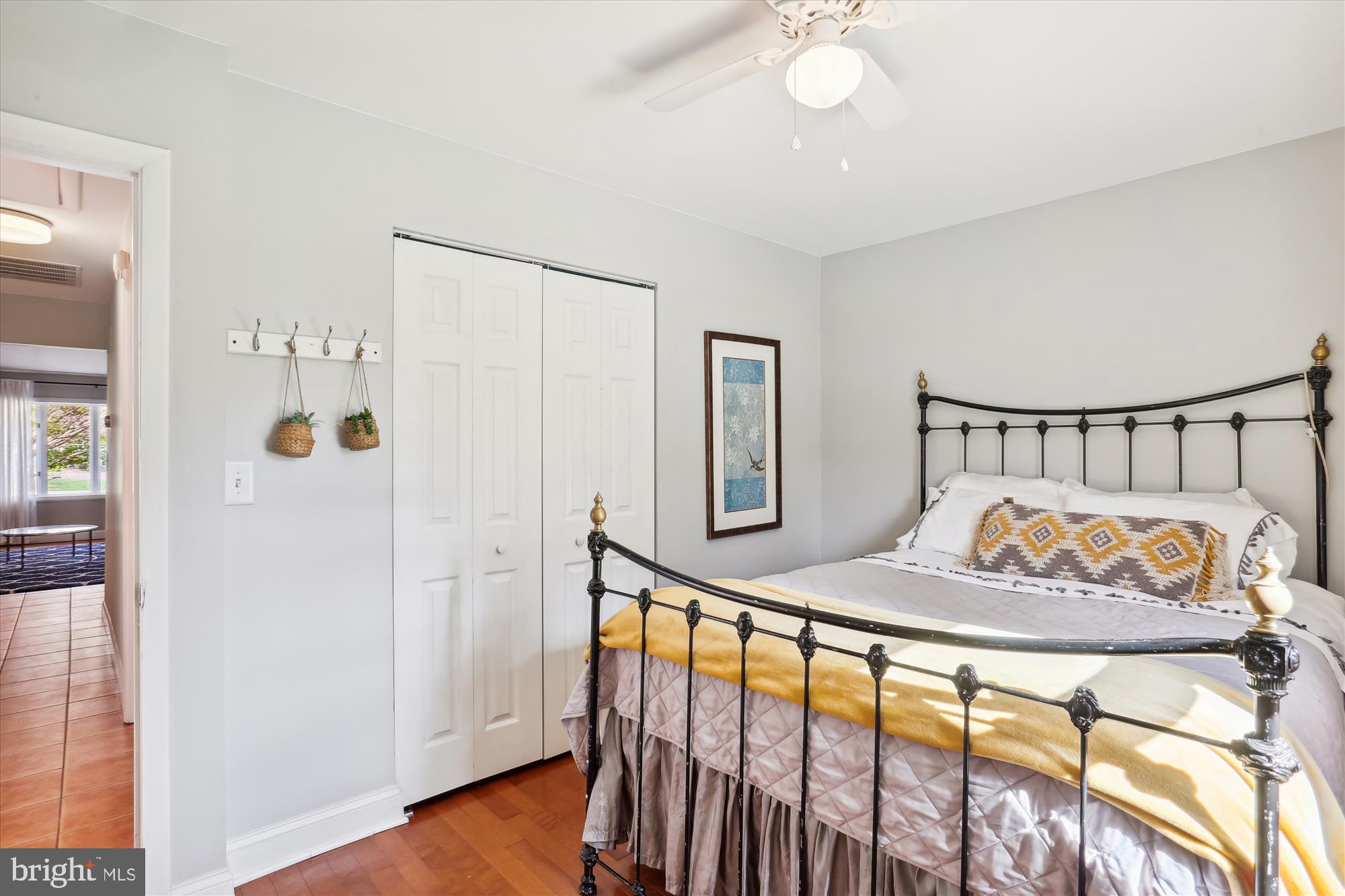 19500 Wootton Avenue Poolesville, MD 20837 - Photo 42 of 62 a bedroom with bed and a chandelier