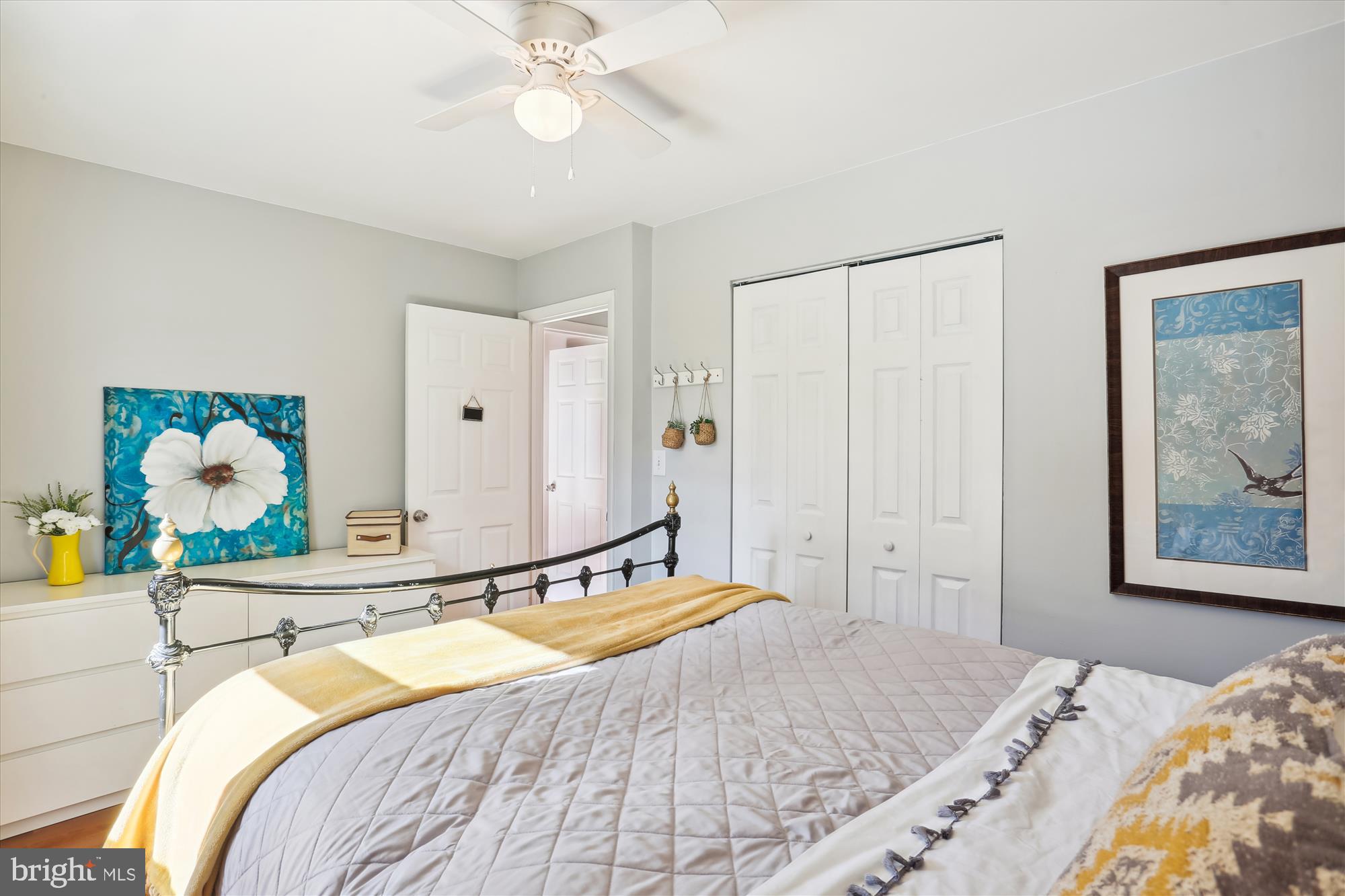 19500 Wootton Avenue Poolesville, MD 20837 - Photo 43 of 62 a bedroom with a bed and a chandelier